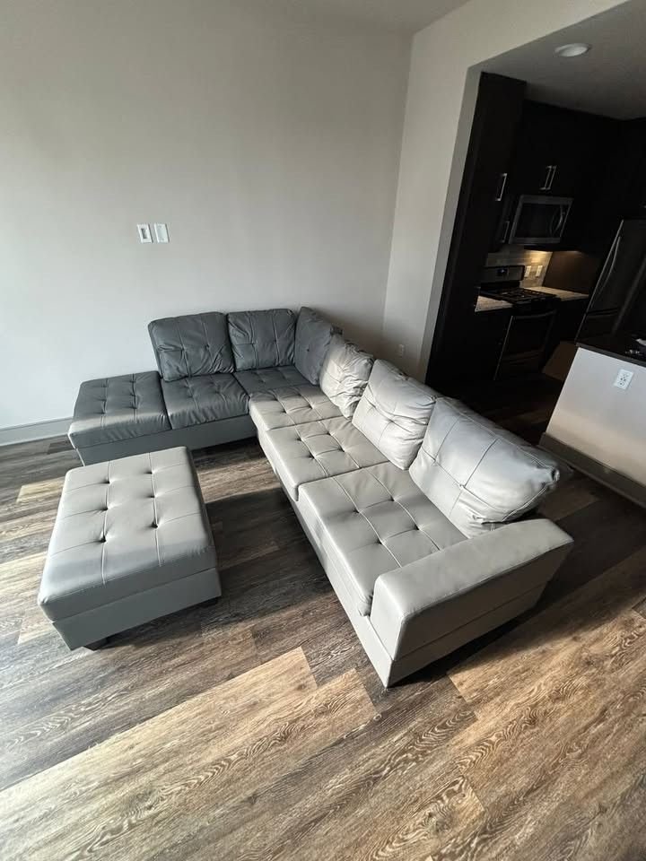 Brand New Leather Sectional Sofa with Storage Ottoman
